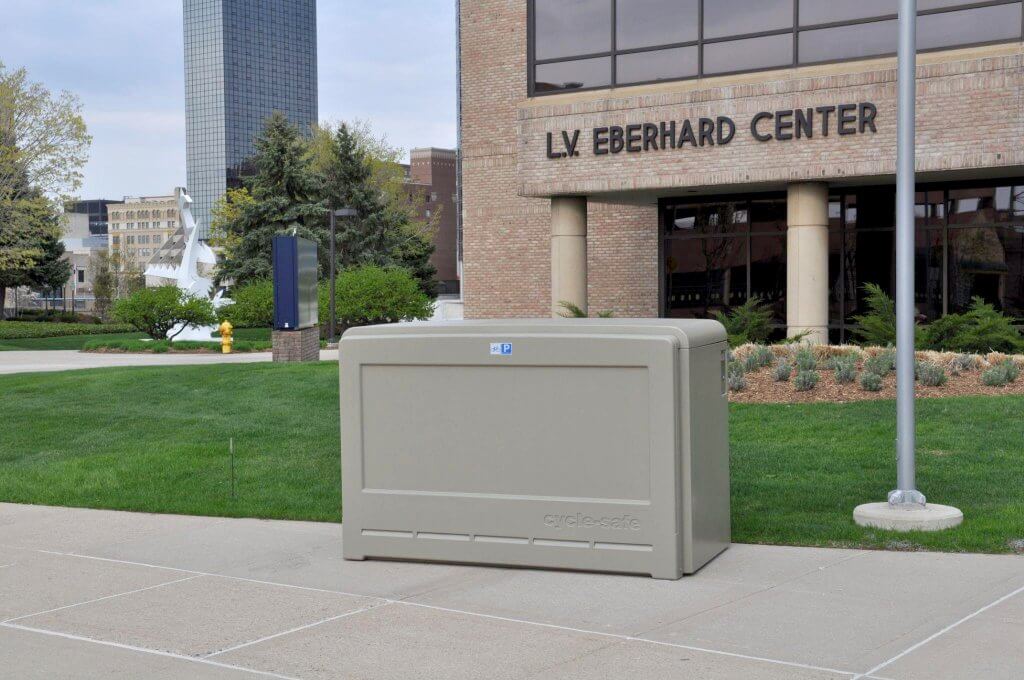 CycleSafe bike locker installed outside the L.V. Eberhard Center on a university campus.