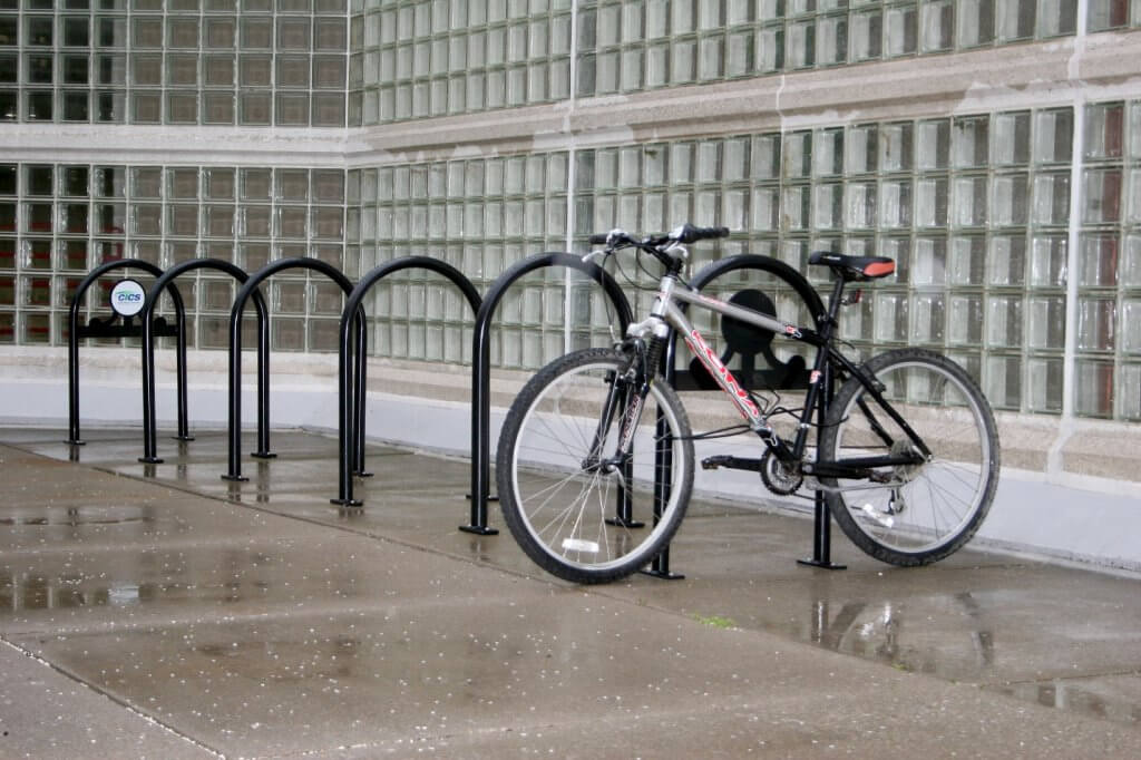 CycleSafe Classic Bike U Racks with two Vintage Bike Racks - Lafayette Model with custom vinyl decals on the ends.