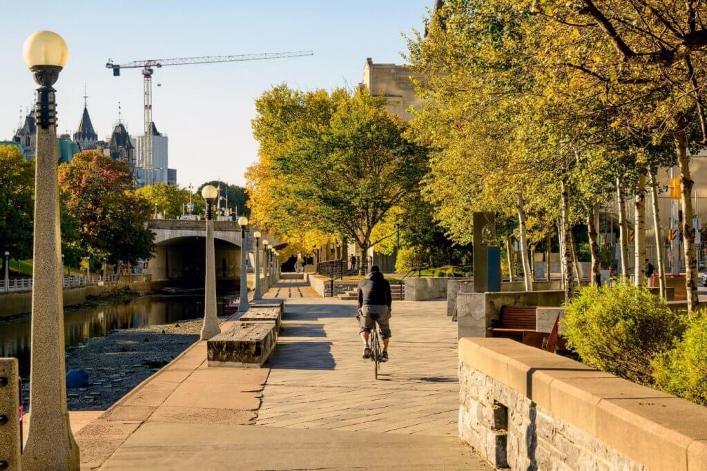 Cyclist on a bike path in downtown Ottawa, Canada