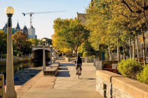 Cyclist on a bike path in downtown Ottawa, Canada